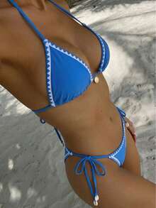Bộ đồ bơi 2 mảnh này bao gồm một áo bikini hai dây in họa tiết màu trơn dễ thương và một quần bơi quyến rũ, hoàn hảo cho kỳ nghỉ hè ở bãi biển hoặc trang phục đi biển thường ngày. - Màu xanh lam - Xem 3