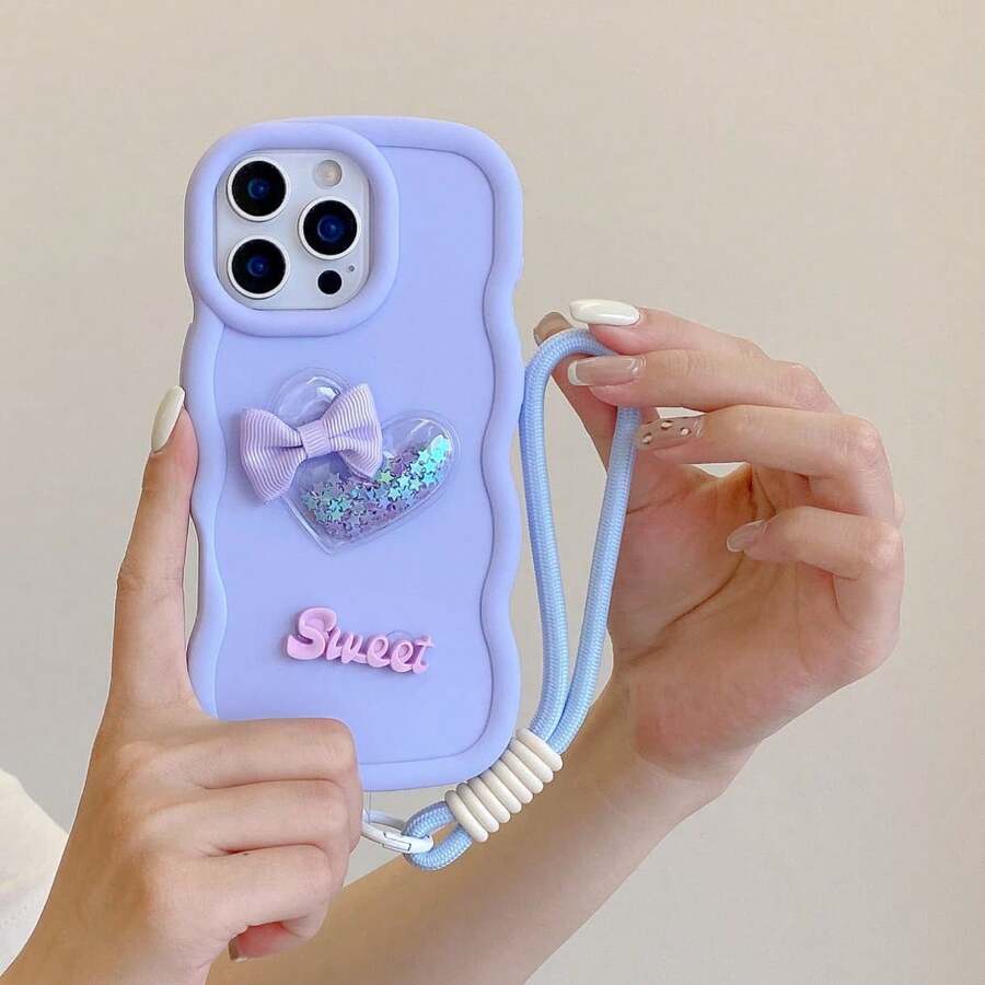 Ốp điện thoại hình trái tim cát lún + chữ cái + dây đeo cổ tay, tương thích với iPhone 17 Pro Max/16 Pro Max/15 Pro Max/14 Pro Max/13 Pro Max/12 Pro Max/11 Pro Max/XS Max/7/8 Plus, tương thích với Samsung S26/25 24 32 1u, tương thích với , Honor. - Màu tím - Xem 1