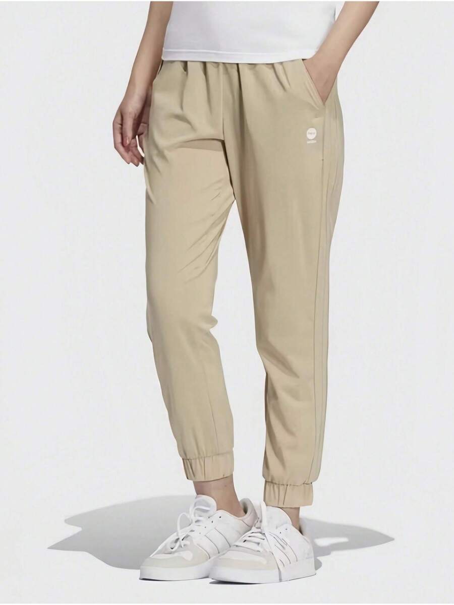 Adidas 長褲女跑步健身訓練戶外時尚休閒舒適加絨運動褲 - 卡其色 - 查看 1