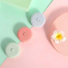 1 pieza Cinta métrica corporal retráctil, diseño flexible de resorte, longitud de 150 cm, adecuada para medir la cintura, el busto y las caderas, cinta métrica de uso doméstico - Multicolor - Ver 12