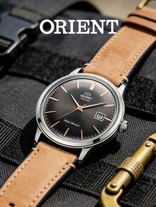 Orient 42毫米男士自动机械腕表，灰色表盘，玫瑰金指针，驼色绒面革表带，拱形表镜，复古简约风格，日期显示，适合日常、夜晚、街头、音乐节、咖啡馆等各种场合，是送给男士和丈夫的绝佳礼物。 - 棕色 - 查看 4