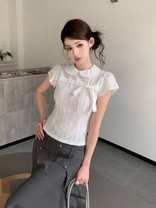 Áo sơ mi trắng tay ngắn cho nữ, kiểu dáng ôm sát, thắt nơ, thích hợp cho mùa hè. - trắng - Xem 5