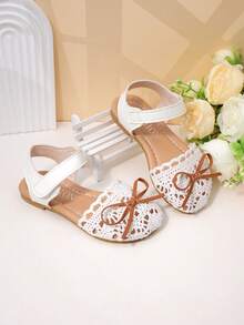 Giày sandal mùa hè công chúa cho bé gái, màu trắng, dệt rỗng, mũi kín, có nơ, khóa dán chống trượt. - trắng - Xem 1