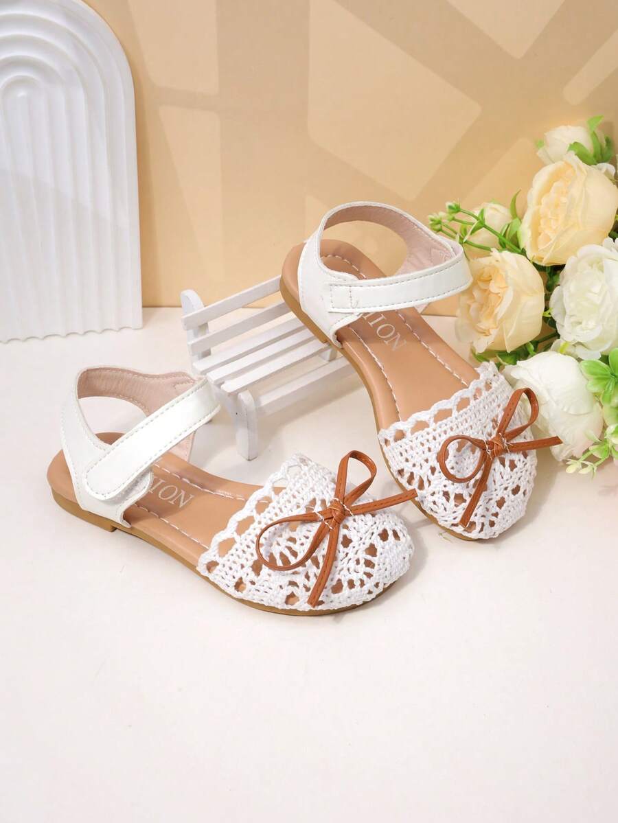 Giày sandal mùa hè công chúa cho bé gái, màu trắng, dệt rỗng, mũi kín, có nơ, khóa dán chống trượt. - trắng - Xem 1