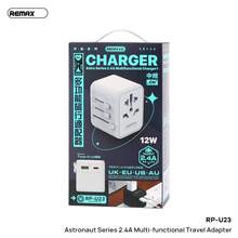 REMAX Aerospace 2.4A Multi-Functional Travel Adapter, Mobile Phone And Laptop Charger, Features A Robust And High-Temperature Resistant PC Fire-Retardant Shell, USB-A And Type-C Interfaces, Both Supporting 12W Charging, And Integrates UK/EU/US/Australian Plugs. - White - View 5