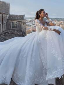 Exquisite V-Neck Long Sleeve Ball Gown Wedding Dress With Cathedral Train, 3D Floral Lace Appliqués, And Illusion Back – Premium Chantilly Lace With Tulle Skirt, Fitted Bodice With Boning, V-Neckline With Off-Shoulder Sleeves, Cathedral Train With Lace Edging, Available In Ivory – Perfect For Spring/Summer Outdoor Weddings, Garden Ceremonies, And Destination Weddings, Lightweight And Breezy Design, Ideal For Warm Weather, International Export Quality, Suitable For Global Bridal Market - trắng - Xem 3