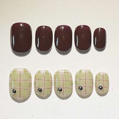 10pcs Pure Handmade Press On Nails Short Nails Oval Nails With A Rich Wine Red Color And A Fresh Matcha Pattern As The Core, Combined With Metallic Rivet Elements, Sweet And Cool Elements Are Intertwined.Gentle Elegant Cute Nails For Ladies And Girls Spring Summer Fall Winter Festivals Parties And Daily Life Use