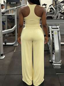 Bộ áo và quần không tay màu vàng ôm sát cơ thể dành cho nữ, thích hợp cho mùa hè. - Màu vàng - Xem 2