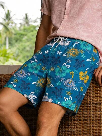 Quần short nam in họa tiết hoa dâm bụt và rùa biển, quần short đi biển dáng rộng có dây rút.