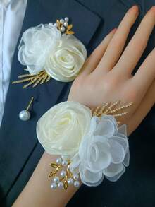 Bộ sản phẩm gồm 1 vòng hoa đeo tay và 1 ghim cài áo hình hoa trà trắng bằng vải chiffon, thích hợp cho đám cưới, tiệc tùng hoặc sử dụng hàng ngày. - Nhiều màu - Xem 5