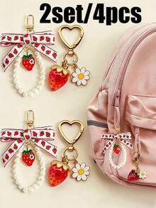 1/2/4 piezas Llavero con colgante decorativo en forma de fresa con perla y lazo de margarita, adecuado para billetera, llaves de coche - Llavero con lazo de fresa - Ver 10