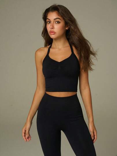 UONNOU 2 piezas de estilos deportivos de primavera y verano para mujeres, con diseño de cuello halter, hombros descubiertos y corto, con características que cinturan la cintura y dan forma al Body, camisetas de tirantes ultra cortas con pliegues que levantan las caderas, ajustan la cintura y controlan el vientre, pantalones deportivos largos de ajuste ceñido que dan forma al Body, conjunto deportivo adecuado para yoga, entrenamiento en el gimnasio, correr y atuendos deportivos casuales y de moda diarios.