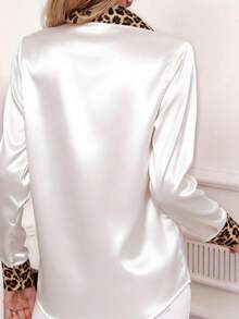 Áo sơ mi nữ dài tay màu trắng họa tiết da báo, có cúc cài, dáng regular fit, chất liệu polyester, thích hợp cho mùa xuân. - trắng - Xem 5