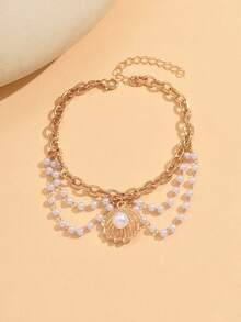 1条手工制作的度假海洋风金色链条脚链，搭配经典仿珍珠，适合日常佩戴、海滩派对、约会、旅行等场合。长度和珠子数量均可定制。 - 彩色 - 查看 2