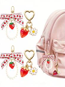 1/2/4 piezas Llavero con colgante decorativo en forma de fresa con perla y lazo de margarita, adecuado para billetera, llaves de coche - Llavero con lazo de fresa - Ver 8