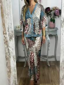 Bộ đồ hai mảnh phong cách Boho thanh lịch dành cho nữ, gồm áo và chân váy in họa tiết hoa cổ điển; một bộ đồ rộng rãi, thoải mái nhưng vẫn thời trang lấy cảm hứng từ phong cách Bohemian; được làm từ chất liệu vải dệt kim co giãn nhẹ, thoải mái khi mặc và là một lựa chọn thời trang đa năng. Mùa hè. - Nhiều màu - Xem 6