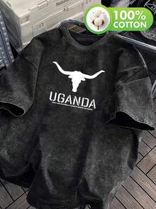 Camiseta ugandesa de algodón puro para hombre con estampado de cuernos de toro y acabado lavado: esta prenda estampada de estilo urbano presenta un corte relajado y letras extragrandes llamativas para un aspecto desgastado, lo que la convierte en una camiseta informal de manga corta y cuello redondo adecuada para hombres. - Negro - Ver 1