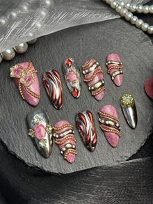 Bộ 10 móng tay acrylic hình hạnh nhân, bộ dụng cụ làm móng nghệ thuật ngày Valentine, móng mắt mèo màu hồng & đỏ, bạc, đỏ, hoàn hảo cho mùa thu và mùa đông. Chúng có họa tiết hoa 3D, các đường sọc vàng lỏng bất đối xứng với hạt thép mạ vàng và đá quý. Hoàn hảo cho các bữa tiệc, đám cưới và sử dụng hàng ngày, những dụng cụ làm móng acrylic này là món quà tuyệt vời dành cho phụ nữ và các cô gái. - Nhiều màu - Xem 4
