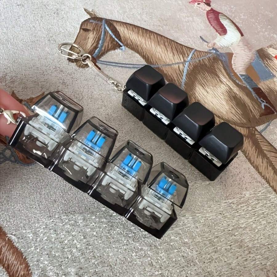 1个随机慢回弹手指减压玩具,键盘造型,配有柔软硅胶猫爪钥匙扣、挂件、手机装饰配件,咔哒作响的键帽减压玩具 - 查看 1