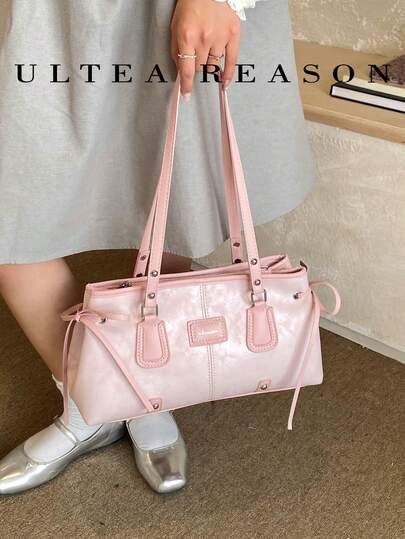 1个纯色PU皮革女士单肩包，时尚方形腋下包，拉链封口，蝴蝶结设计，适合女孩、女士、大学生、年轻职业人士、上班族，非常适合办公室、学校、工作、商务、通勤、户外、旅行、购物等场合。