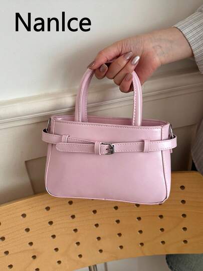 A Sophisticated And High-End Plain-Colored Model Of A Daily Commuting Minimalist Bag, Designed Specifically For Women And Featuring A Modern Style With A Crossbody Strap, Released In 2026.