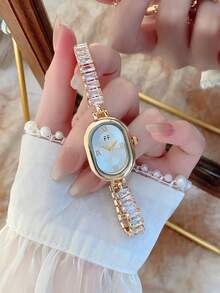 1 chiếc đồng hồ đeo tay nữ bằng hợp kim vàng, kiểu dáng bất đối xứng, mặt số chữ số Ả Rập thời trang, máy quartz, dây đeo có thể điều chỉnh, thích hợp để đeo hàng ngày và làm quà tặng ngày lễ. - Vàng - Xem 2