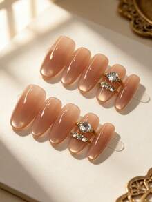 10 móng tay giả thủ công, màu nude trong suốt, đính đá zirconia hình bầu dục, phong cách nghệ thuật móng tay tối giản sang trọng, phù hợp cho việc đi lại hàng ngày, móng giả dán tái sử dụng. - Nhiều màu - Xem 4