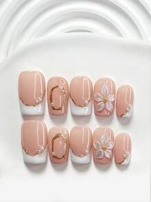 Bộ 10 móng giả kiểu Pháp mềm mại, màu vàng kim, móng dán, trang trí móng bằng ngọc trai nhỏ, trang trí móng hoa 5 cánh thủ công, sơn móng tay màu trắng, phong cách thời trang thanh lịch, bao gồm dụng cụ làm móng (1 miếng dán gel + 1 dũa móng), 3 kích cỡ: vuông, vuông ngắn, hạnh nhân, phù hợp cho tiệc tùng, sử dụng hàng ngày, chụp ảnh, phụ kiện làm móng mùa xuân/hè. - Nhiều màu - Xem 11