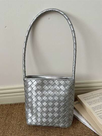 春日银色PU编织女士单肩包，简约腋下迷你水桶包，适合女士购物