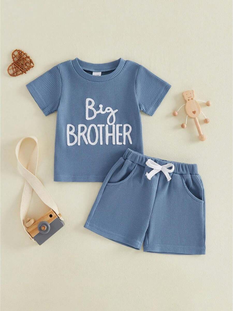Conjuntos de pantalones cortos de verano para niños, camisetas de manga corta con cuello redondo y bordado de letras, y pantalones cortos de color liso. - Azul - Ver 1