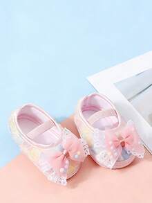 0-12个月婴儿软底鞋，女婴蕾丝蝴蝶结公主鞋，学步鞋，新生儿第一步鞋 - 粉色 - 查看 1