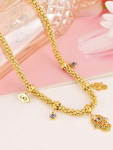 1 chiếc dây chuyền mặt hình mắt và lòng bàn tay bằng thép không gỉ, thích hợp cho nữ giới đeo hàng ngày. - Vàng - Xem 2