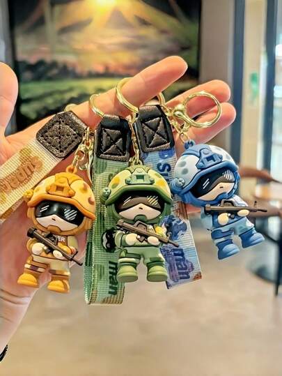 1 pieza Llavero de soldado de anime, llavero con temática militar, forma rectangular con anillo desmontable, accesorio creativo y de moda para bolso y llave de coche, llavero de soldado de fuerzas especiales con camuflaje de dibujos animados, figura de soldado súper genial, accesorio unisex para bolso