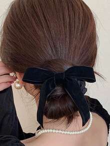 1个女士黑色丝绒蝴蝶结发圈，适合日常、夏季、度假、旅行，可作马尾辫发圈、橡皮筋发带、发绳。 - 黑色蝴蝶結 - 查看 1