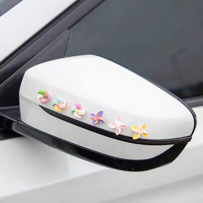 6个迷你风车摆件，适合汽车内饰装饰。经久耐用的风车摆件，创意旋转设计，提升氛围。