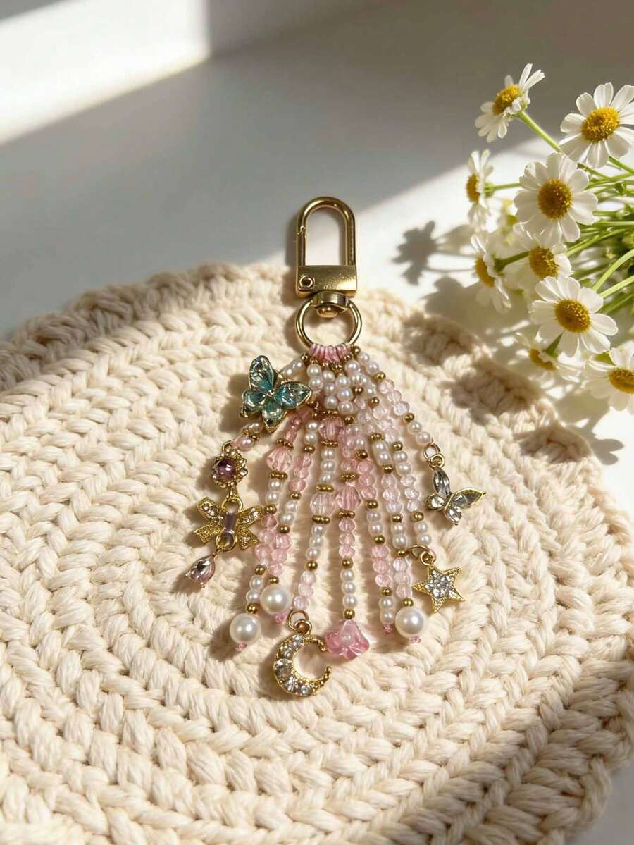 Mặt dây chuyền hình ngôi sao tua rua màu hồng phấn tinh tế, thiết kế hình bướm, sao và trăng đính hạt, phụ kiện trang trí túi điện thoại nữ tính, thanh lịch. - Nhiều màu - Xem 1