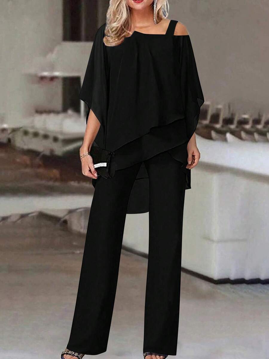 Bộ đồ 2 món gồm áo lệch vai màu đen bằng vải chiffon và quần ống rộng, thích hợp cho tiệc tùng, kỳ nghỉ và mặc hàng ngày vào mùa hè.