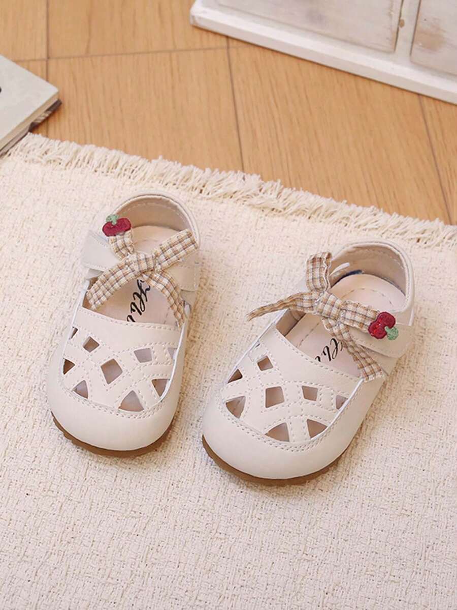 1双夏季新款婴儿镂空软底幼儿鞋，樱桃蝴蝶结公主鞋，透气防滑幼儿鞋 - 米色 - 查看 1