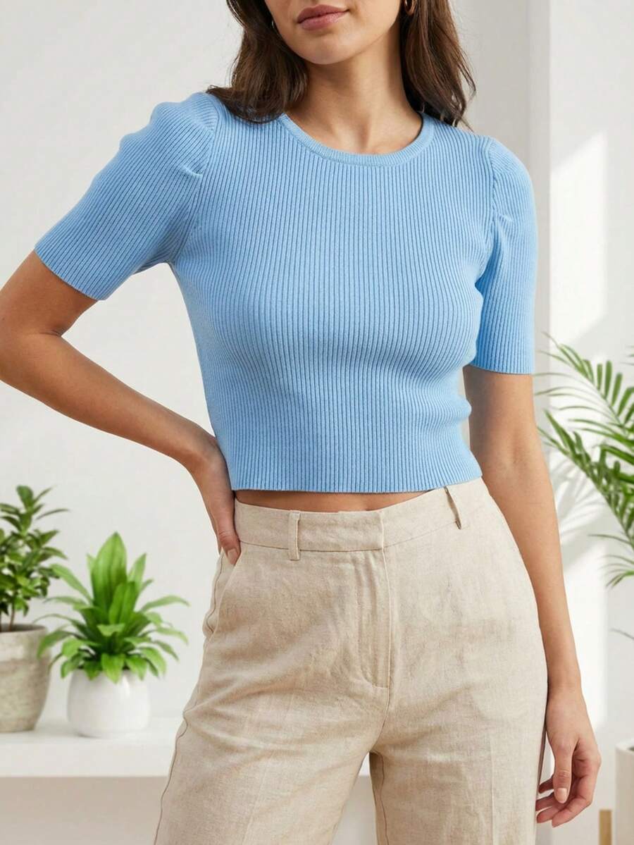 Top corto de punto para mujer, manga corta abullonada, tejido acanalado, cuello redondo, ajuste elástico, diseño juvenil y femenino, ideal para combinar con jeans, shorts y faldas, prenda ligera ideal para primavera y verano, estilo casual y elegante, ideal para el colegio o looks de oficina, outfits urbanos y looks cómodos - Azul - Ver 1