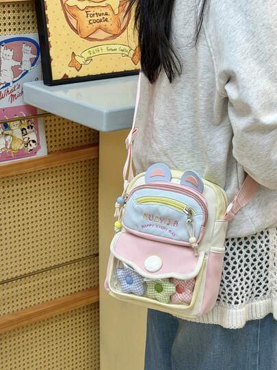 1个可爱柔软迷你单肩包，高魅力多巴胺少女百搭斜挎包，可爱耳朵和字母装饰，撞色清新小巧轻便手机袋，日式痛包，高品质尼龙材质透明装饰包，适合日常通勤、购物、聚会、搭配JK制服等。