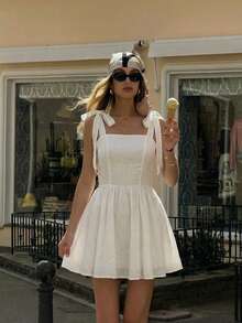 Đầm hai dây không tay màu trơn dáng suông HoloChill 2026 dành cho nữ, kiểu dáng thường ngày, mẫu mới mùa hè, thắt nơ phía trước với eo nhún, đầm hè cho nữ, đầm đi nghỉ mát, đầm dự tiệc thanh lịch, đầm đi biển, đầm dự đám cưới, trang phục ngoài trời, đầm sinh nhật, đầm duyên dáng, đầm đi nghỉ mát biển, đầm thường ngày cho nữ. - trắng - Xem 9