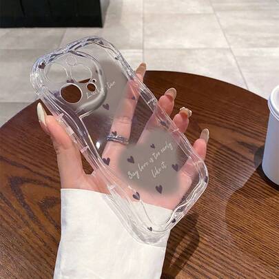 1个时尚TPU材质心形图案透明奶油质感防震防滑保护手机壳，兼容、荣耀等。