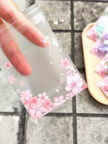 100个粉色透明磨砂OPP礼品袋，可重复密封的包装，适合婚礼、派对和生日茶会 - 尺寸为2.76X3.94英寸，非常适合圣诞礼物、生日礼物、高档礼物、小物件和活动回礼。 - 多色 - 查看 3