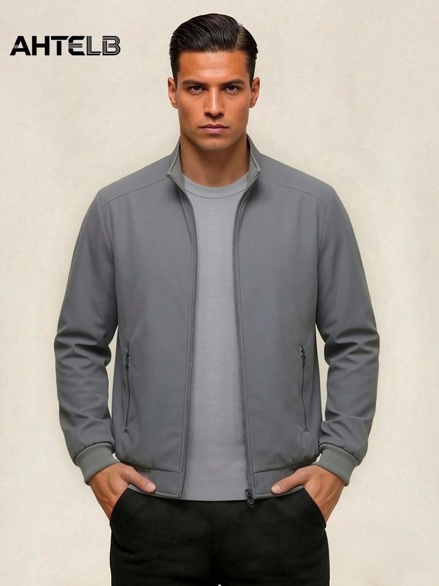 AHTELB Chaqueta de hombre para primavera y otoño con cuello alto, chaqueta casual de entrenador de unicolor de moda, chaqueta exterior de hombre minimalista y versátil con solapa, bolsillos con cremallera antirrobo, puños acanalados, ropa urbana, adecuada para uso diario casual y recreación, chaqueta deportiva de hombre - Gris - Ver 1
