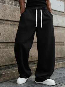 1 chiếc quần dài nam ống rộng, màu trơn, dáng suông thoải mái, chất liệu mềm mại, phù hợp cho đi bộ hàng ngày, đi làm, du lịch và các dịp khác. Có thể dùng làm quà tặng cho cặp đôi. Chất liệu 100% polyester, có dây rút ở eo để điều chỉnh, nhiều màu sắc để lựa chọn. - màu đen - Xem 11