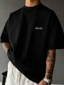 Camiseta de manga corta negra para hombre, estampado de letra inglesa Meeds blanca en el pecho, estilo minimalista de moda, ropa para uso diario - Negro - Ver 1