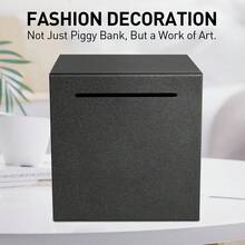 Ống tiết kiệm bền chắc, phải đập vỡ mới mở được, chất liệu thép không gỉ, có thể đựng tiền thật, hũ tiết kiệm bằng kim loại chắc chắn và bền bỉ. - màu đen - Xem 5