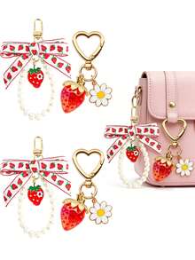 1/2/4 piezas Llavero con colgante decorativo en forma de fresa con perla y lazo de margarita, adecuado para billetera, llaves de coche - Llavero con lazo de fresa - Ver 9