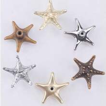 2 pièces Poignées de placard en forme d'étoile de mer en métal - Boutons de tiroir en métal brillant, poignées de décoration pour cuisine et maison, design compact à trou unique, forme cylindrique, accessoires de porte de placard | Thème océanique | Métal brillant, décoration étoile de mer - Multicolore - Voir 8