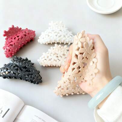 Kẹp tóc hình hoa rỗng bằng nhựa cỡ trung bình, kẹp tóc búi, phụ kiện tóc nhẹ nhàng, phù hợp với tóc dài vừa phải, dùng hàng ngày.